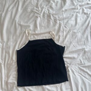 Chic Black Camisole with White Trim